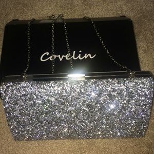 Sliver hand clutch bag